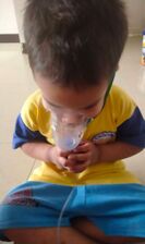 Boy nebulizing Large.jpg